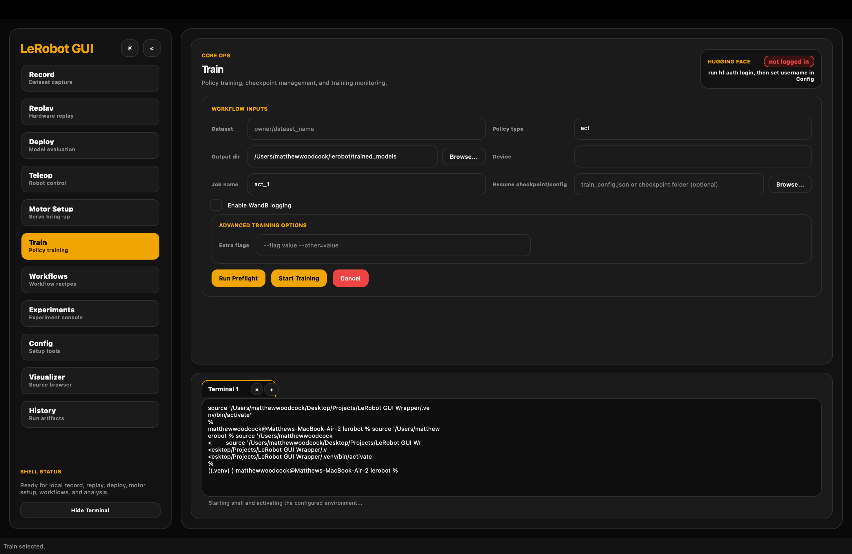 LeRobot GUI train tab with policy inputs, preflight controls, and integrated terminal panel.