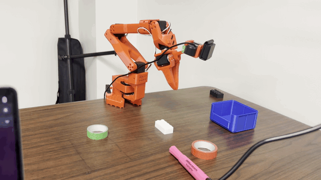 Robotic arm pick-and-place policy rollout demo.